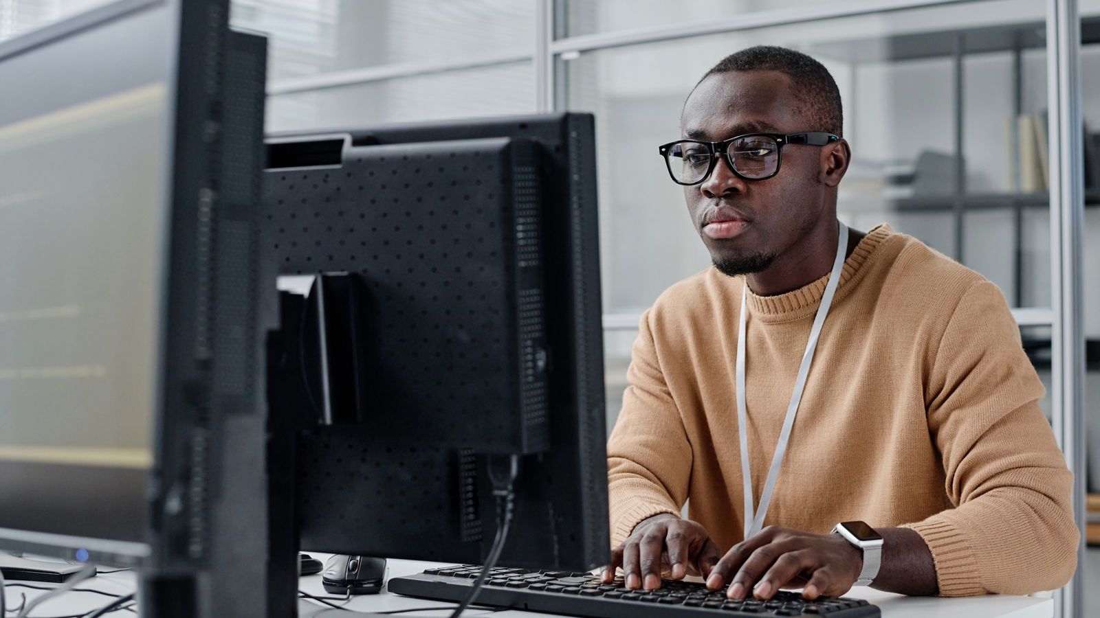 Programmer concentrating on his computer