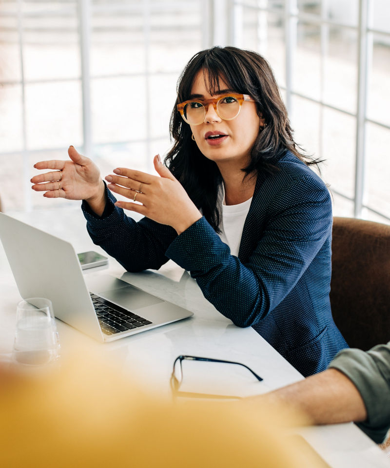 Professional woman talking to her team 