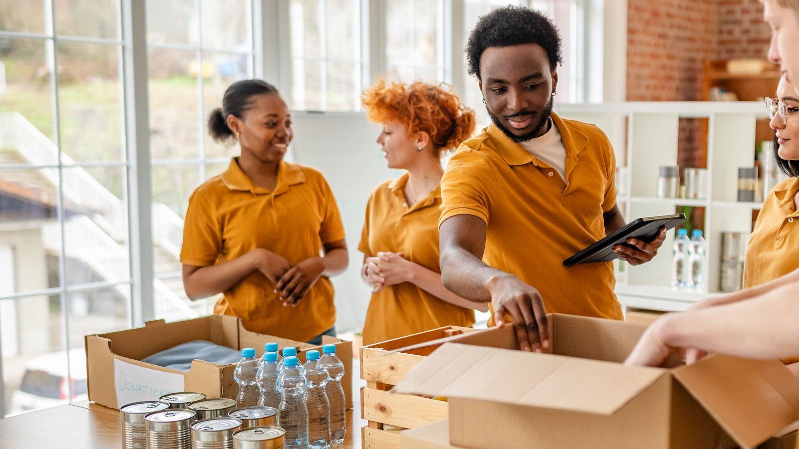 Nonprofit workers preparing donations