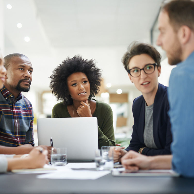 Team of colleagues having a meeting in a office