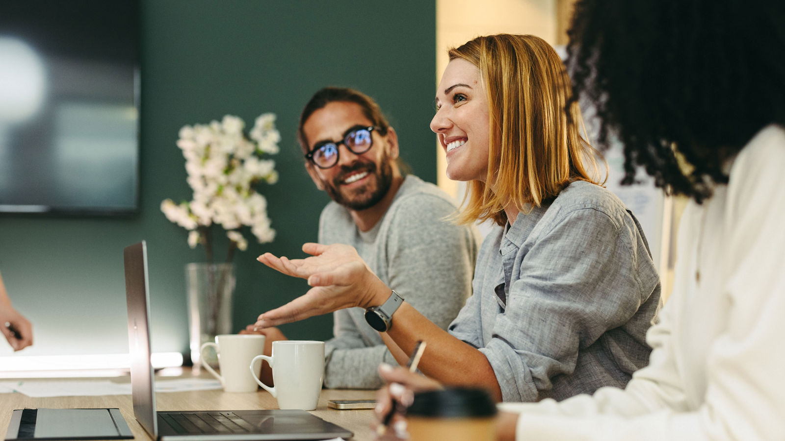 Woman presenting work at meeting