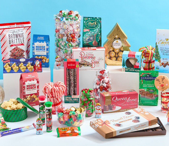 Christmas candy, treats & snacks: Reese's Trees, Lindor Lindt, Ghiradelli, and Ferrero Rocher chocolates, PEZ candy, candy canes,  Moose Munch, peppermint bark, cookie pops & more,