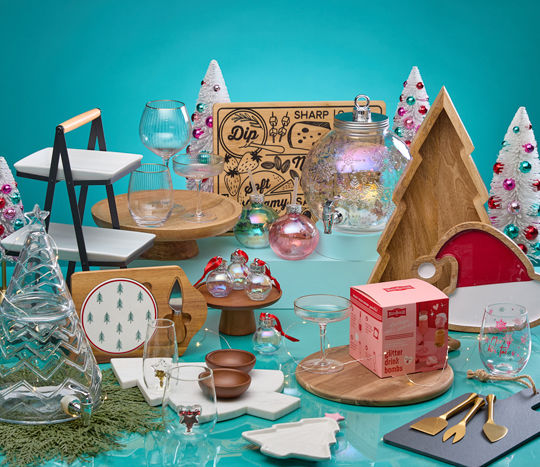 Gift ideas for the entertainer from pOpshelf: wine glasses, wooden charcuterie boards, glitter drink bomb & more.