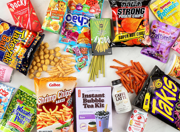 variety of snack foods opened with products coming out on tabletop