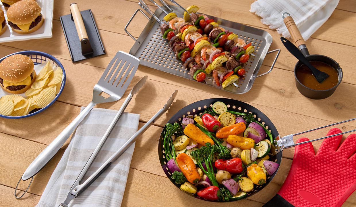 Grilling tools and accessories from pOpshelf: grill pan, grill sheet, long-handled tongs, spatula, burger press & more.