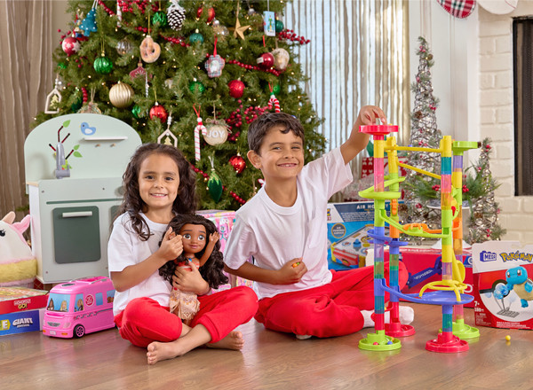 Kids playing with toys from pOpshelf that they got for Christmas.