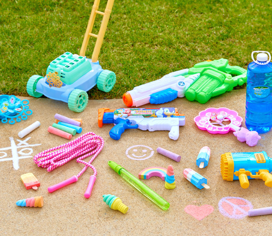 Sidewalk chalk in popsicle, rainbow, and other designs, bubbles, bubble wands, and water squirters from pOpshelf.