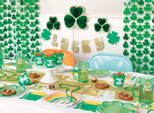 St. Patrick's Day party items: rainbow & shamrock plates, pot of gold & rainbow napkins, green party cups & mugs, necklaces, wall decorations & more.