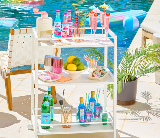 Poolside barcart with colorful plastic cups, Skinny Mixes, and Craft cocktail mixes, fish bowl drink kit, ice shaver & more..