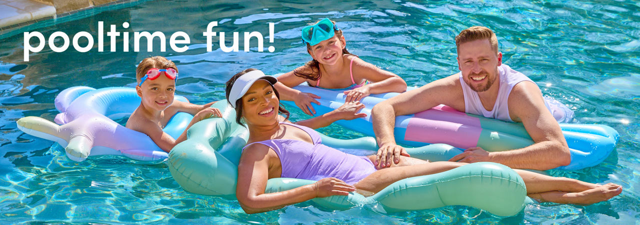 Family floating in the pool on rafts and pool floats from pOpshelf.
