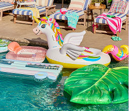 Novelty pool floats featuring fun shapes like unicorns, leaves, and classic pool float shapes.
