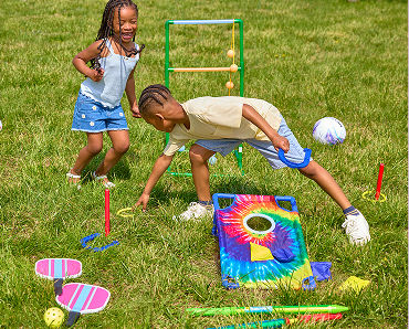 Kids in yard playing with water squirters, jumbo 4-in-a-row, rainbow sprinkler & more.