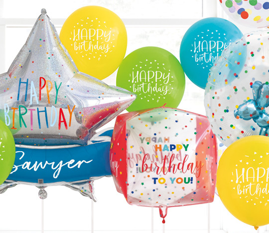 Birthday balloons: large foils star balloon, birthday cake foil balloon, and latex balloons in multiples colors.