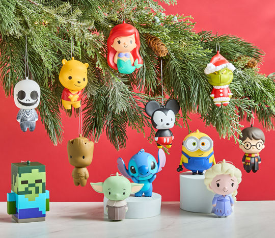 Christmas tree branch decorated with Hallmark licensed Christmas Tree ornaments from pOpshelf: Stitch, Grinch, ELF, 