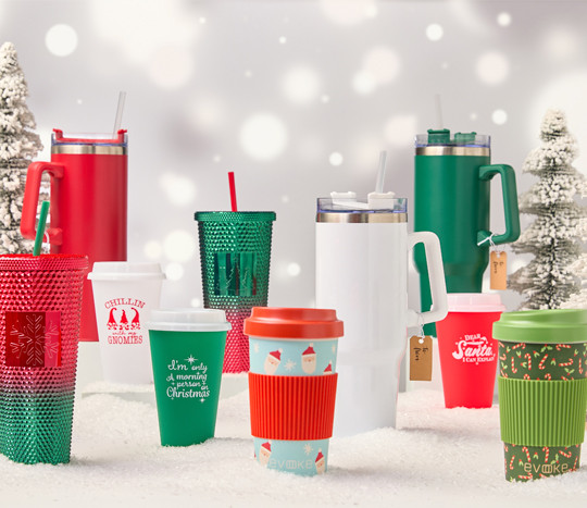 Festive travel cups for the holidays: 40-oz stainless-steel cups, travel cups with sleeves and lids, and diamond metallic tumblers with lids.