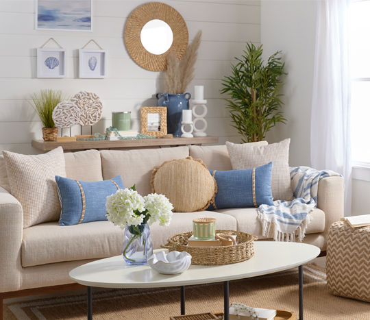 Coastal finds from our home shores collection:pillows, woven mirror, decor, floral & more.