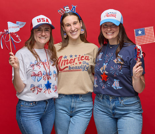 Women wearing red, white & blue patrioc apparel & accessories from pOpshelf: USA trucker hats, patriotic earrings and necklaces, patriotic headbands, patriotic t-shirts, and more.