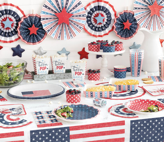 Table set with red, white & blue July 4th party supplies from pOpshelf.