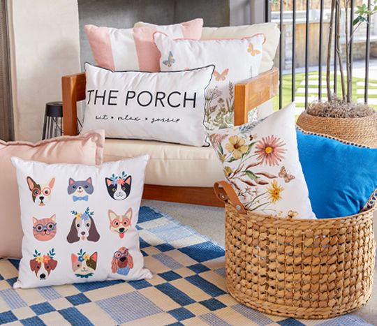 Outdoor pillows on chair in patio setting