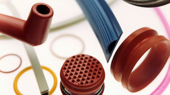 Various extruded and molded SILASTIC fluorosilicone rubber parts, including electronics plug, bearing seal, weatherseal, sparkplug boot, O-rings, tubing, etc. SILASTIC Fluorosilicone Rubber/G.I. Product publicity/Current G.I. Various extruded and molded SILASTIC fluorosilicone rubber parts, including electronics plug, bearing seal, weatherseal, sparkplug boot, O-rings, tubing, etc. SILASTIC Fluorosilicone Rubber/G.I. Product publicity/Current G.I.