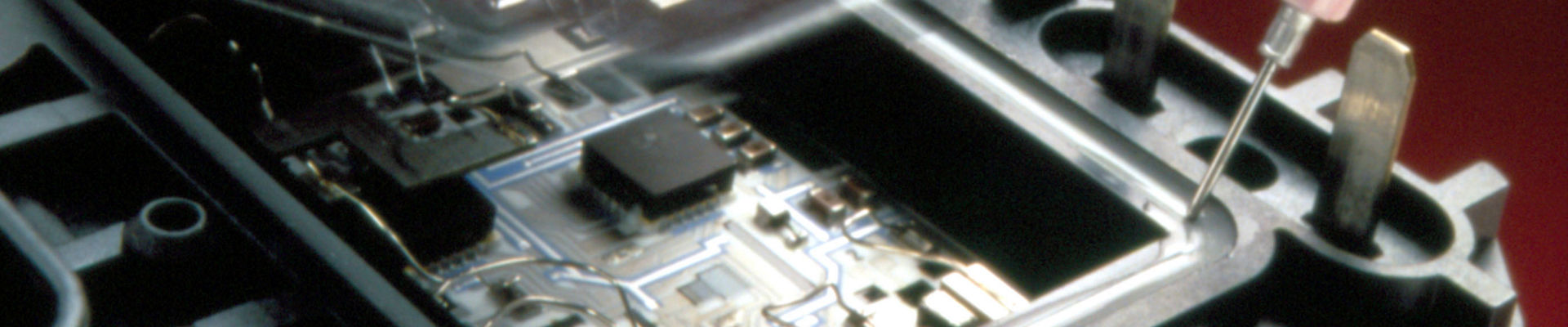 Adhesive applied to seal heatsink assembly.