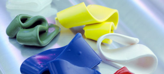 Various-colored strips of Silastic silicone rubber ... red, yellow, green, blue and white colors. Products of Dow Corning STI. Similiar Image Available. Silastic silicone rubber Product promotion