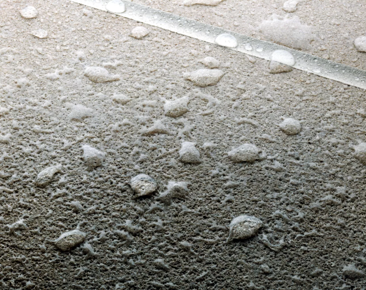 Water drops on treated concrete