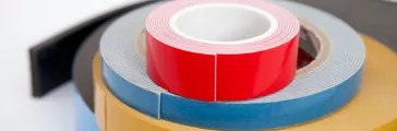 Assorted rolls of double-sided adhesive tape. Used for Labelexpo 2013.