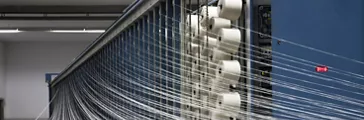 Yarn warping machine in a textile weaving factory. / Dreamstime Image #19517229