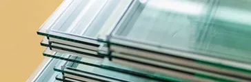 Sheets of factory manufactured tempered float glass panels cut to size.