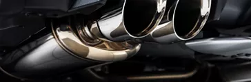 Close-up of clean car muffler