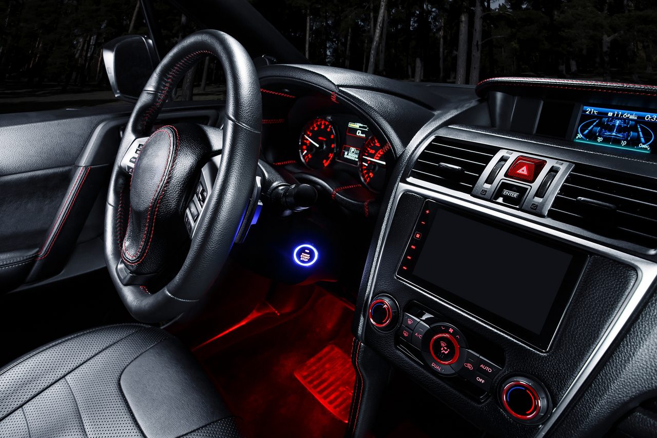black car interior with red lights 