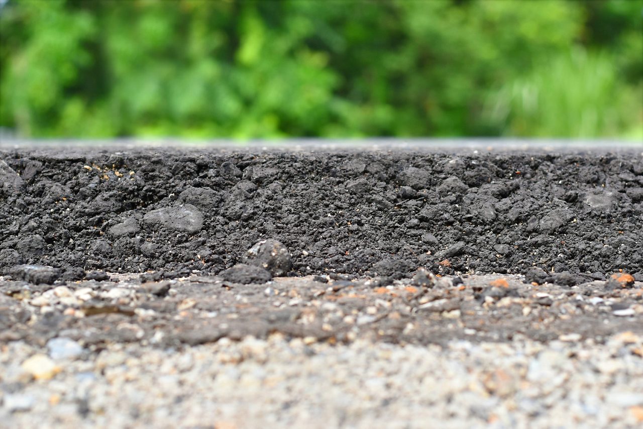 Close up view of the side of a paved road