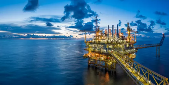 Panorama of Oil and Gas central processing platform in twilight, offshore 