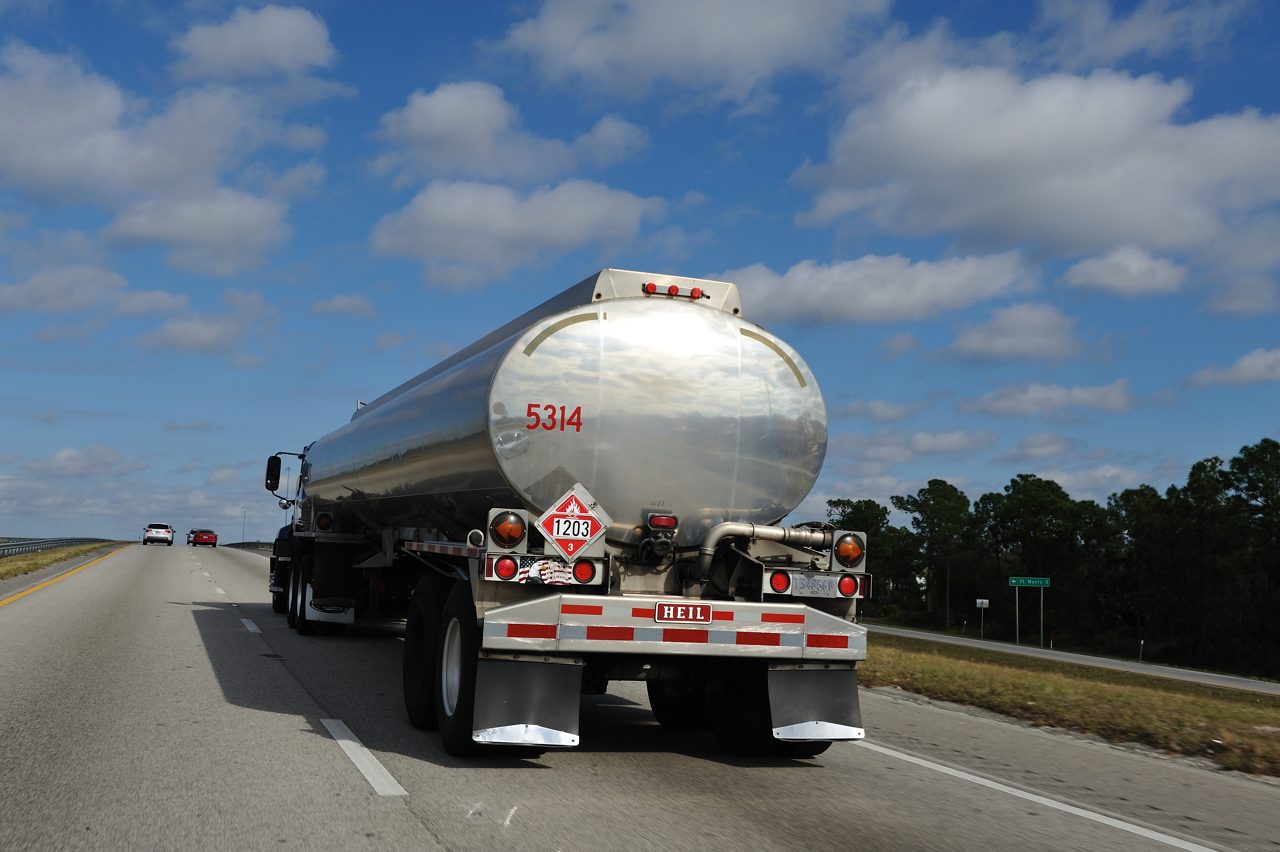 Tanker truck on the highway, view from behind