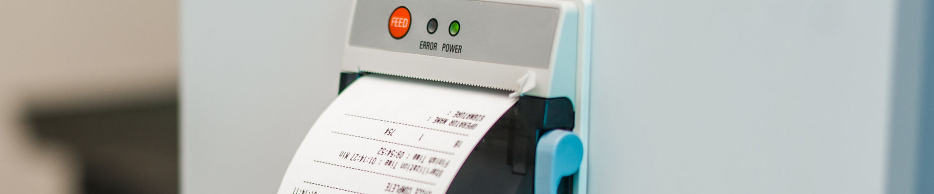 Machine printing a receipt on thermal paper 