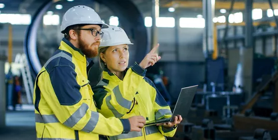 People in hard hats and high vis protective gear