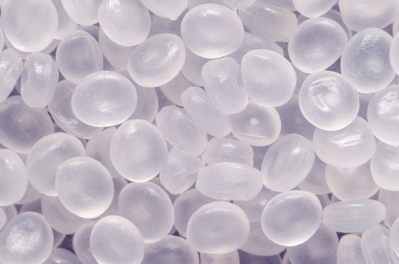Polypropylene granule close-up background texture 