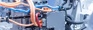 Chassis of the electric car with powertrain and power connections closeup.