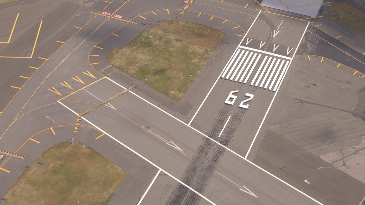 Pavement surface and flight markings on an empty runway