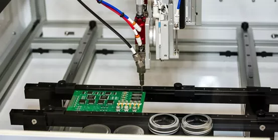 Flexible robotic conformal coating and dispensing system for selective coating potting, bead, and meter-mix dispensing applications.