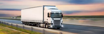 Truck with container on highway, cargo transportation concept.