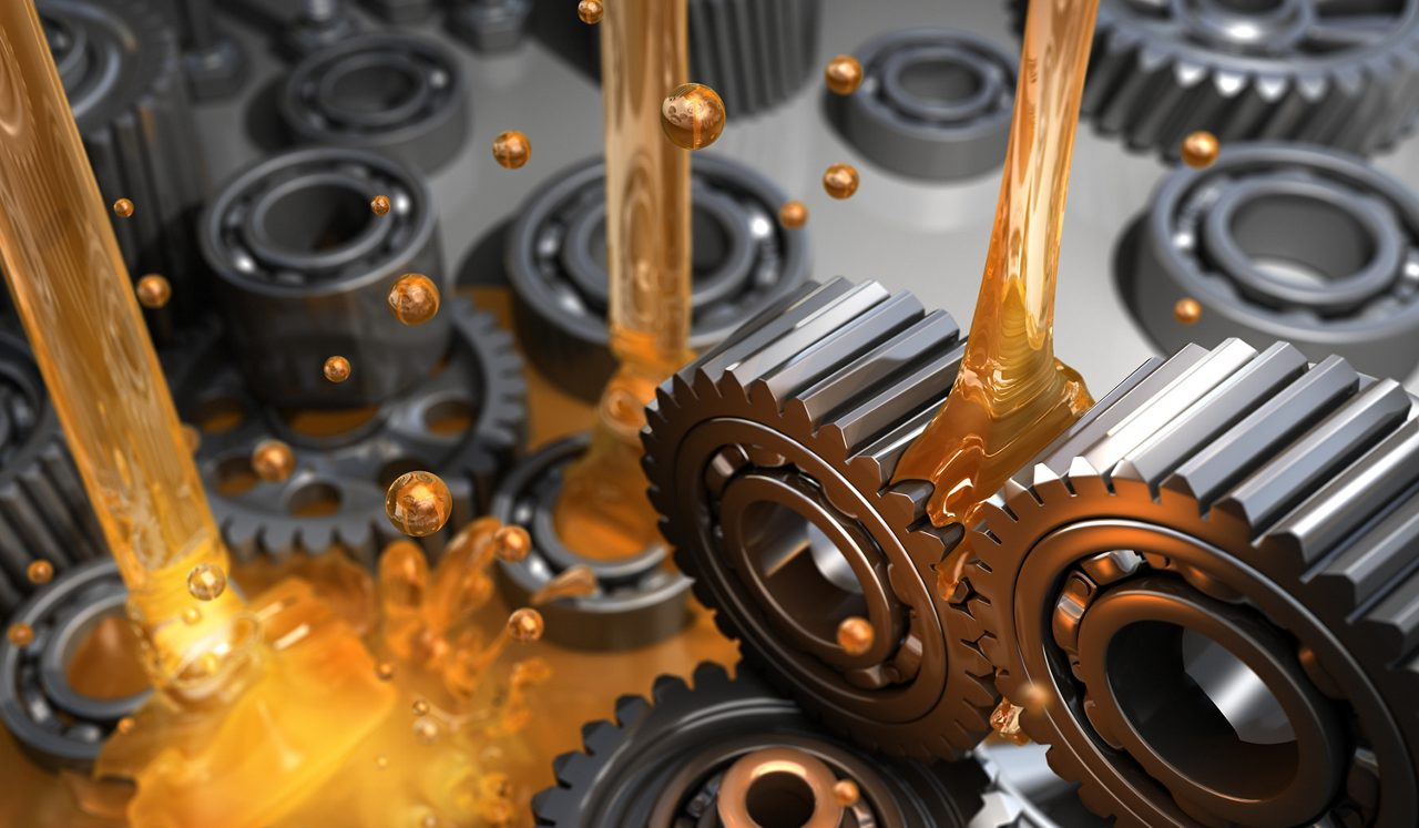 Oil lubricant being poured into gears
