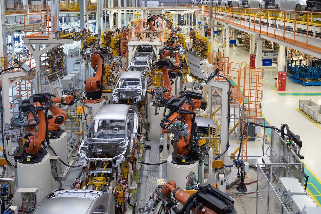 Car assembly line in factory 
