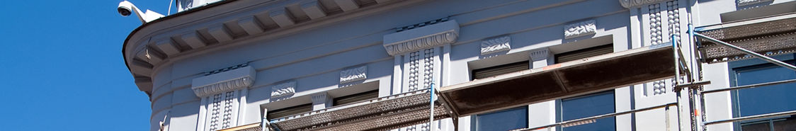 Scaffolding near the facade of a building for restoration.