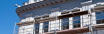 Scaffolding near the facade of a building for restoration.