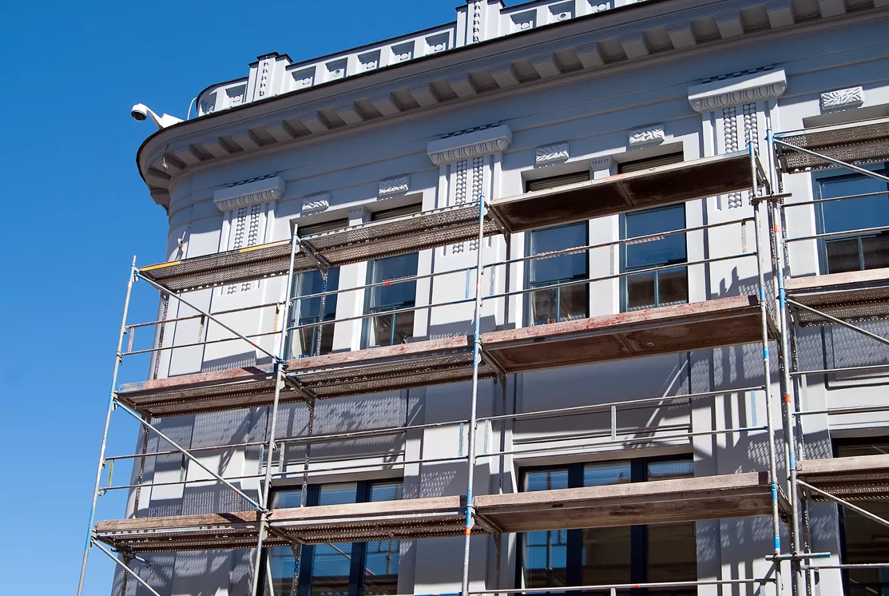 Scaffolding near the facade of a building for restoration.