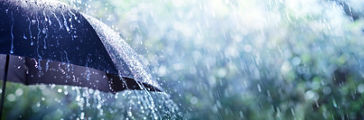Raindrops falls off umbrella