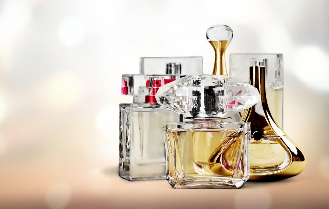 Various perfume bottles with transparent decorative caps 