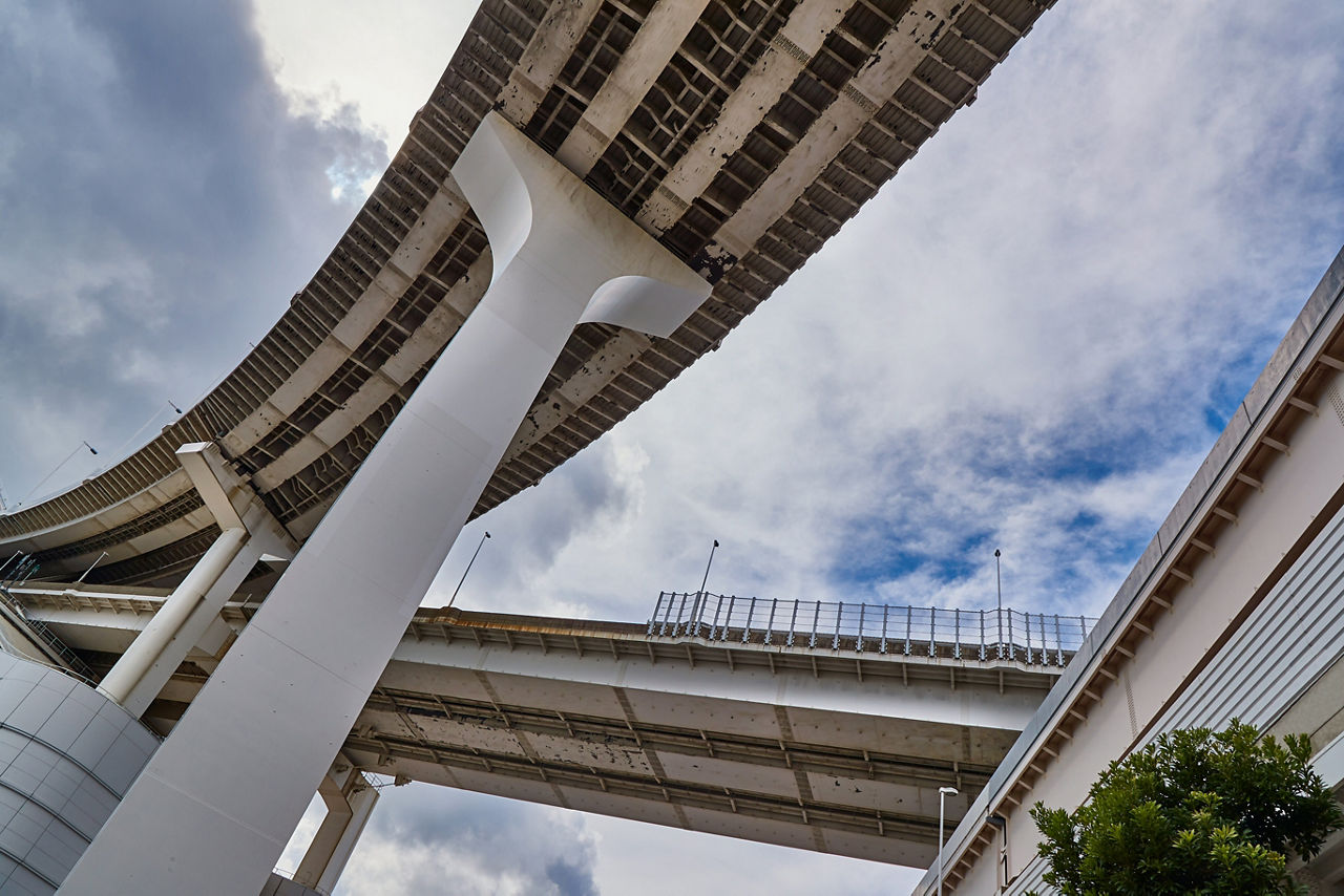 Underside of elevated highways with sky in background